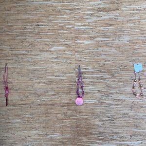 (Bundle) 3 pink necklaces, one w earrings.